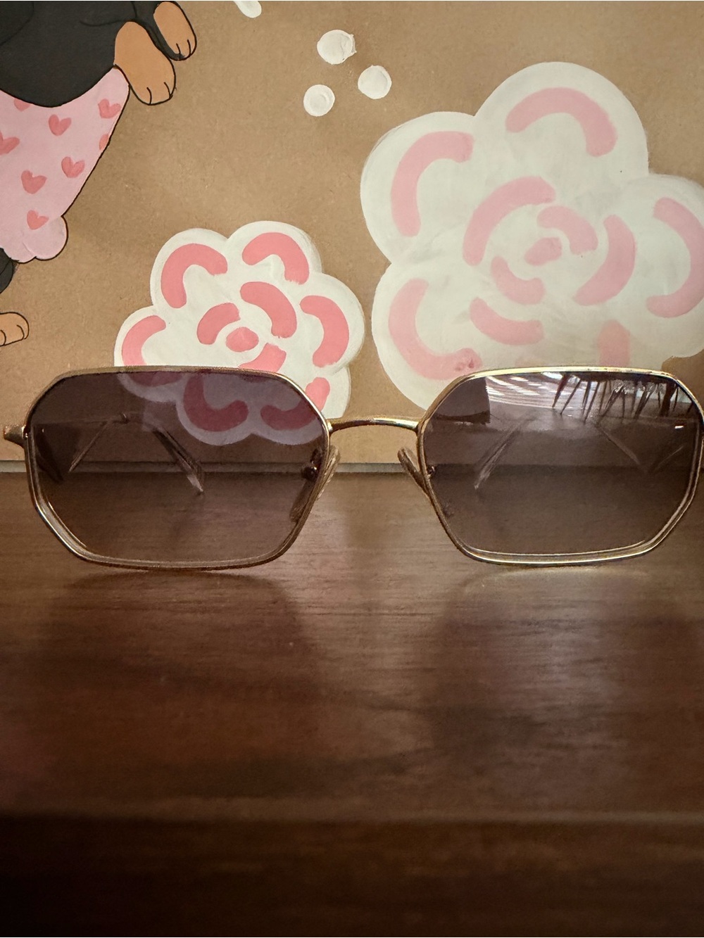 Prada Gold Metal Frame Sunglasses with gray gradient lenses